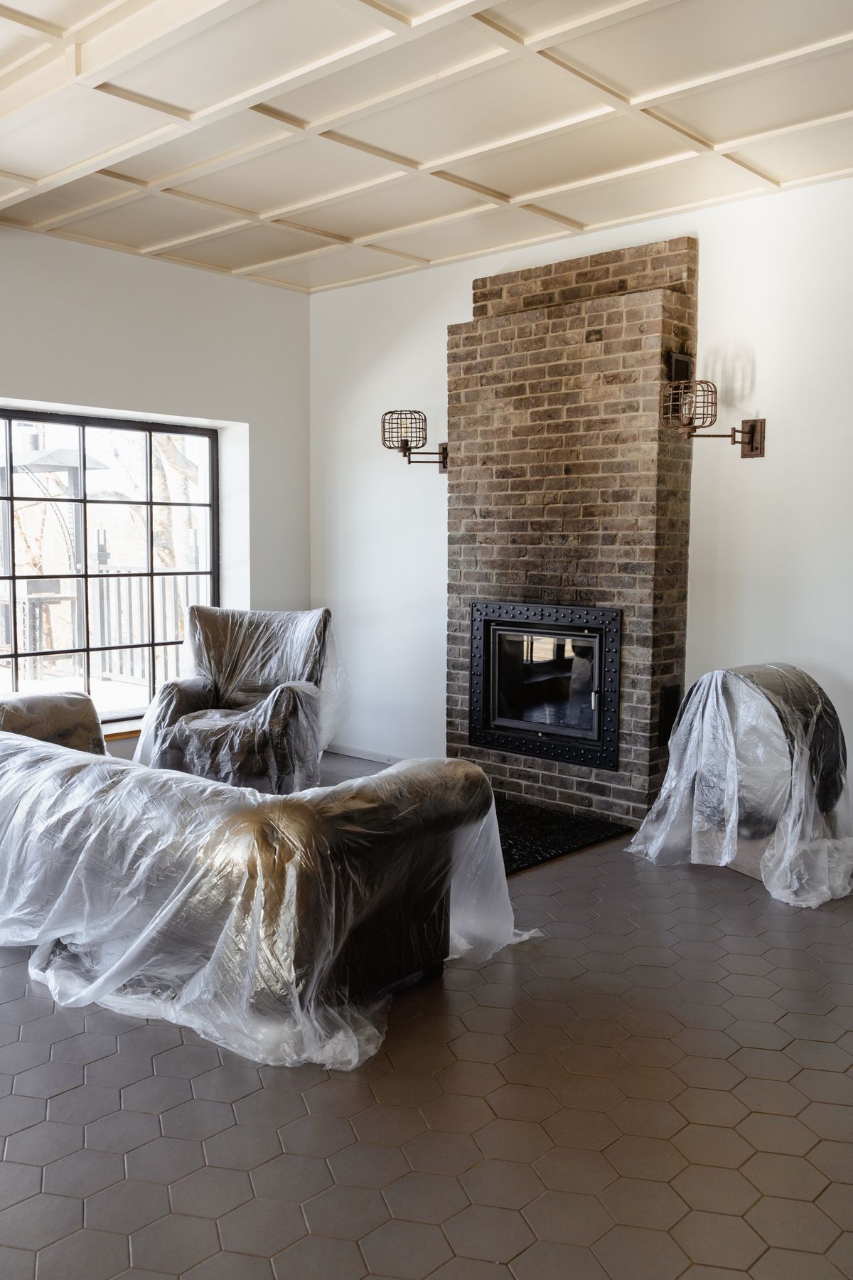 Protection of floors, furniture, and fixtures during painting, followed by work-area cleaning.